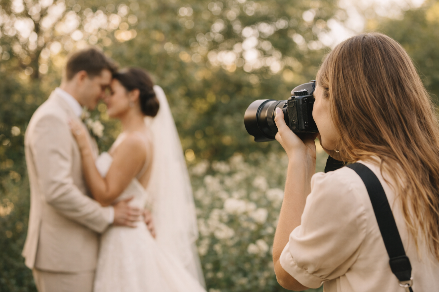 Wedding photographer capturing the couple
